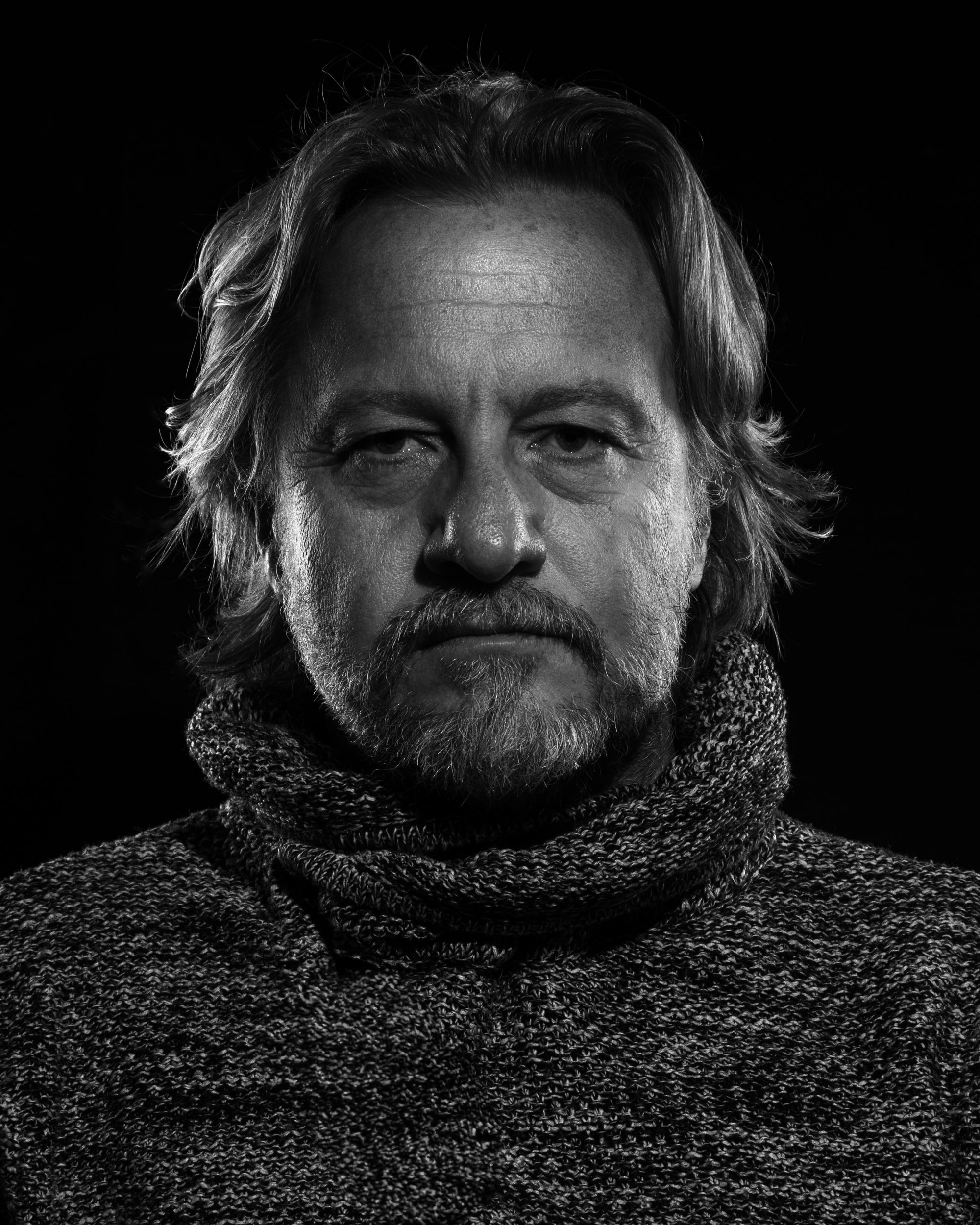 Black and White photograph of a bearded man